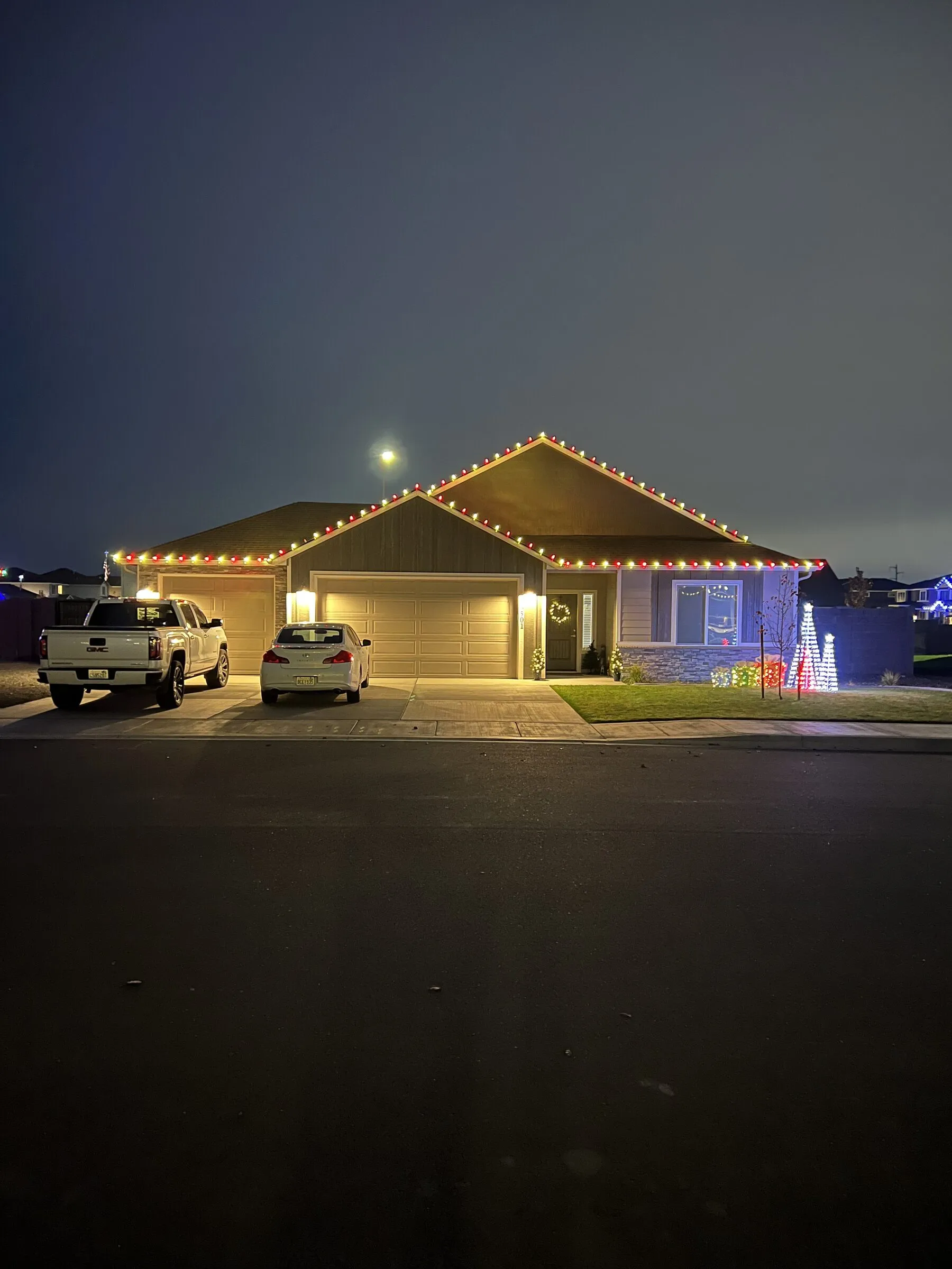Roofline peaks lit in warm white
