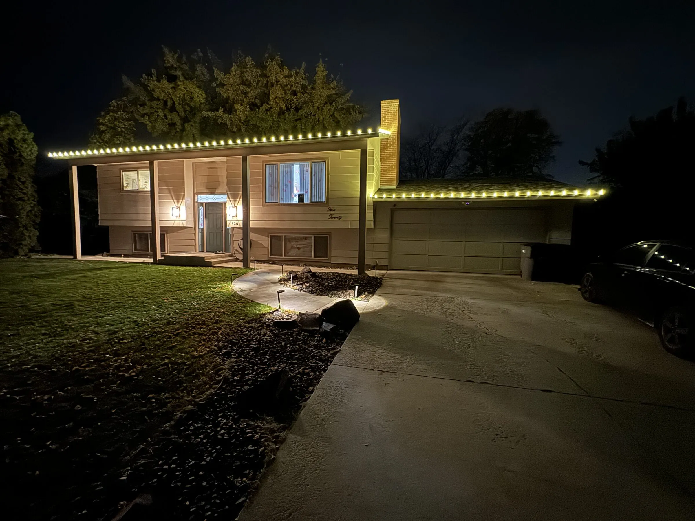 Split-level home with roofline lights